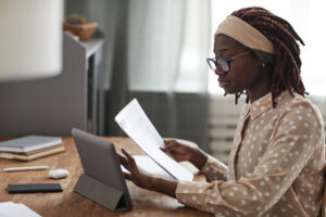 Woman reading about feasibility study value from CDS.