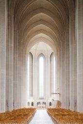 The there windows and ceilings of a Cathedrel with white marble pillars and arches. Chuch capital campaigns show the importance of common ground. CDS  Fundraising.