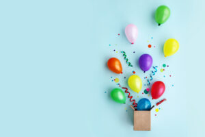 Party balloons and confetti for anniversaries and capital campaigns celebrations from CDS.